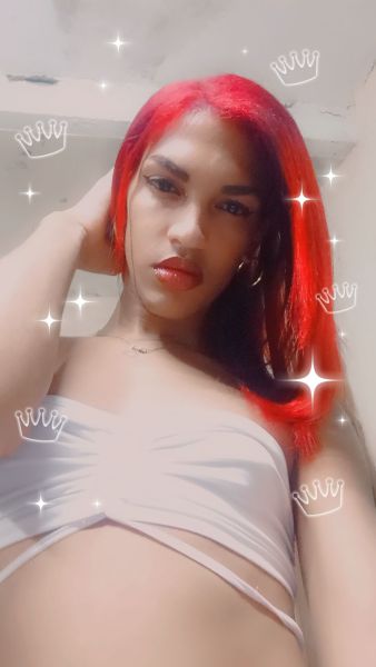 Chica Trans scort de 23 años alta piel morena pelo rojo super sexy y discreta 